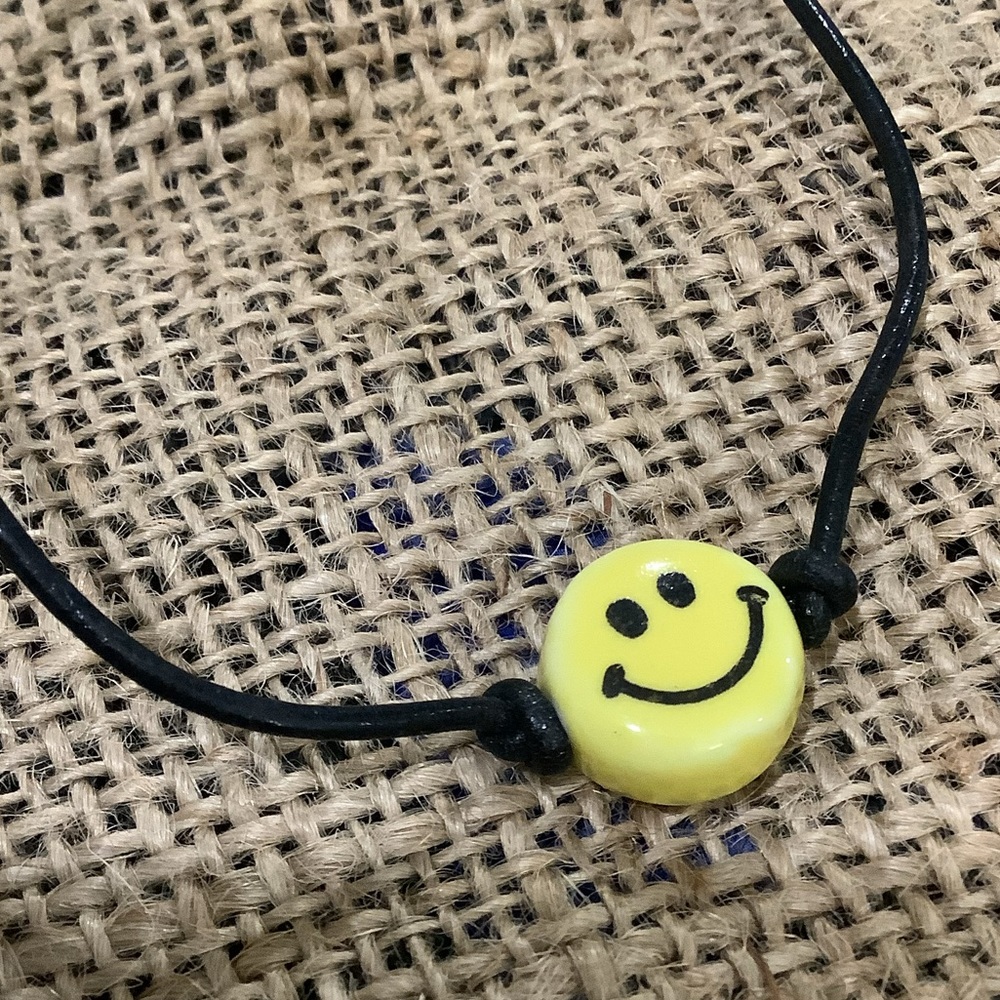 Handmade Happy ceramic charm boho smiling leather cord necklace
